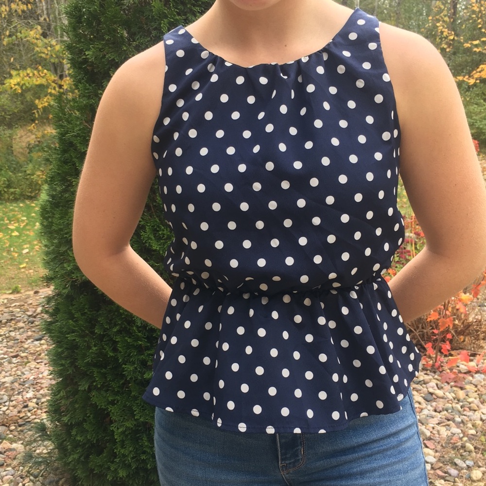 Peplum navy tank with polka dot